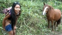 HD Peeing Next To Horse In Jungle